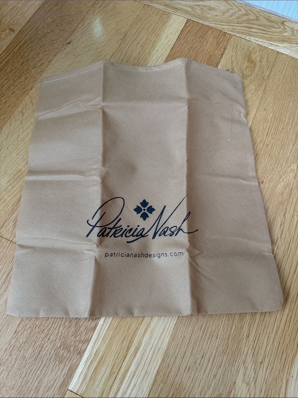 Patricia Nash Tan Dust Bag with Black Logo